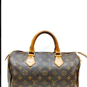 Louise Vuitton. Fair condition still look great